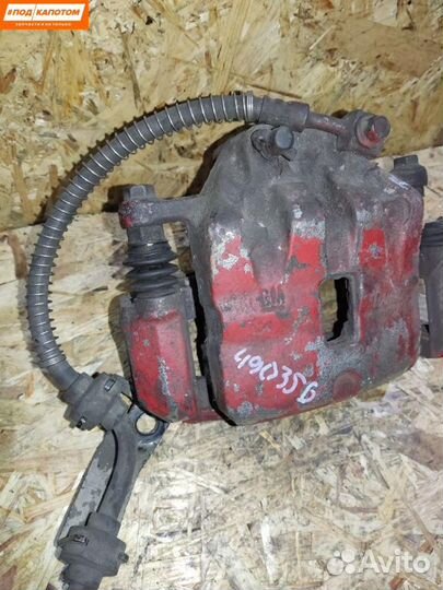 Суппорт тормозной передний правый Opel Astra J