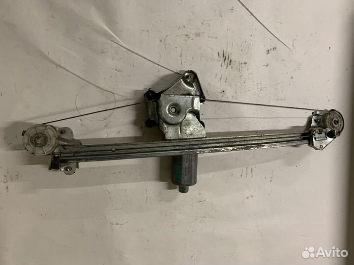 Моторчик стеклоподъемника задний левый L