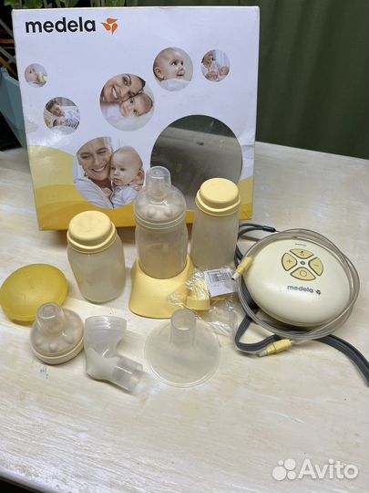 Молокоотсос medela электрический