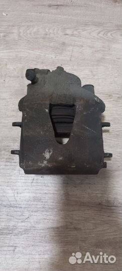 Суппорт тормозной передний Skoda Octavia A5