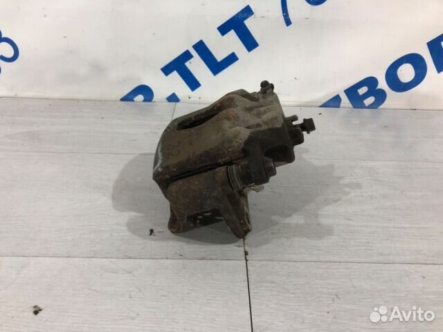 Суппорт передний правый KIA RIO 3 рест 1.4 AT хетч