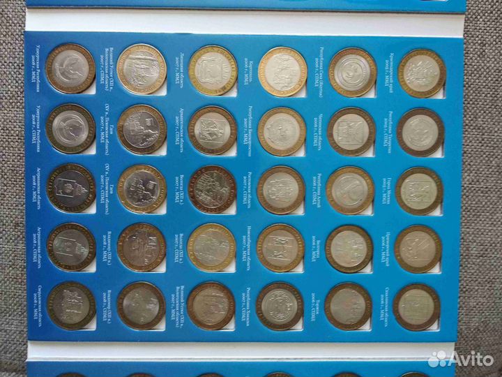Альбомы с юбилейными 10 р. монетами. Биометалл