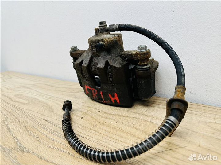 Суппорт тормозной передний левый Kia Cerato 3 2.0