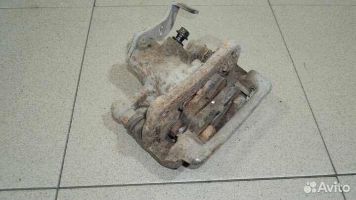 Суппорт задний левый Hyundai Solaris 1