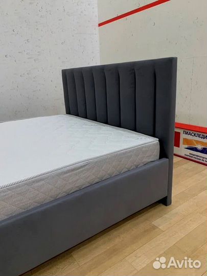 Кровать с подъемным механизмом