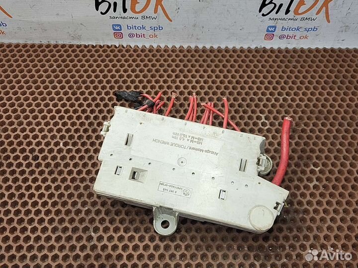 Блок предохранителей в ногах пассажира BMW e39