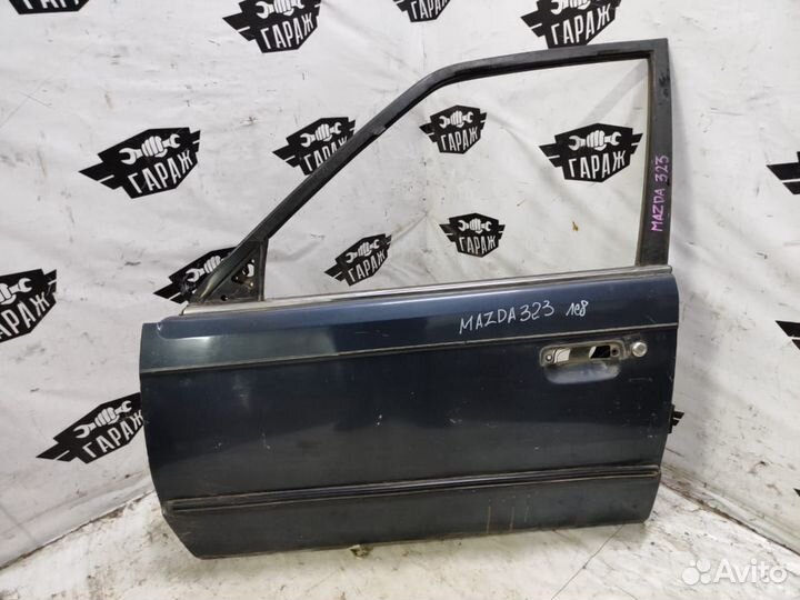 Дверь передняя левая Mazda 323