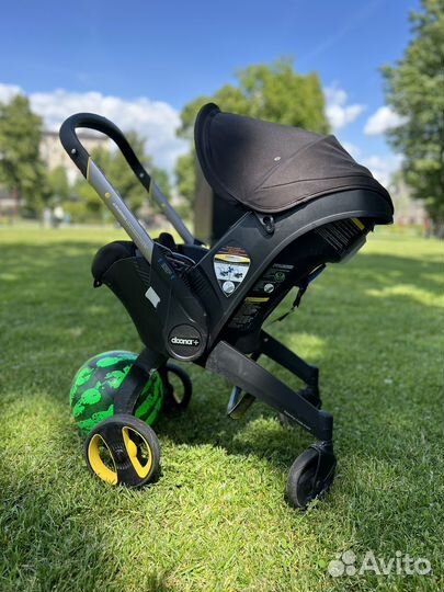 Коляска автокресло Doona с базой isofix