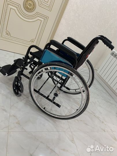 Инвалидная коляска новая