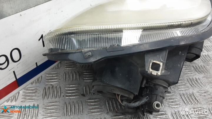 Фара левая Nissan Primastar рест. 2008