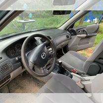 Mazda 323 1.5 MT, 2000, битый, 380 000 км, с пробегом, цена 170 000 руб.