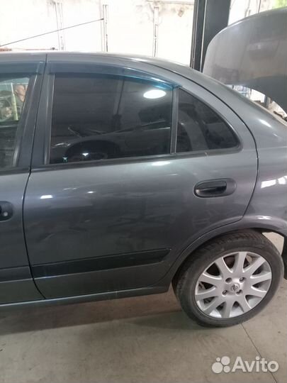 Дверь задняя левая Almera