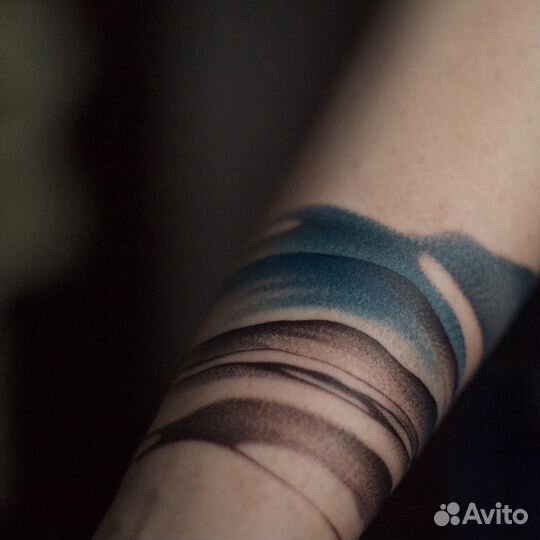 Мастер татуировки