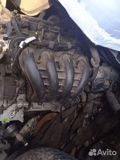 Коллектор Мазда 2.0