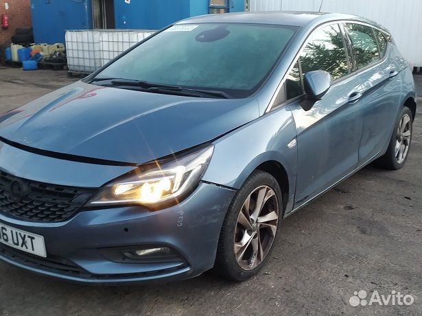 Суппорт задний левый Opel Astra K