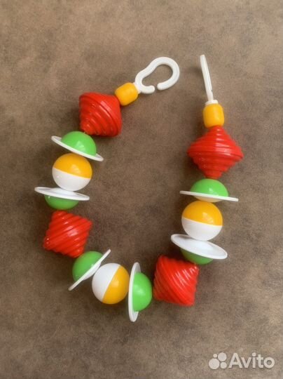 Растяжка в коляску погрямушка