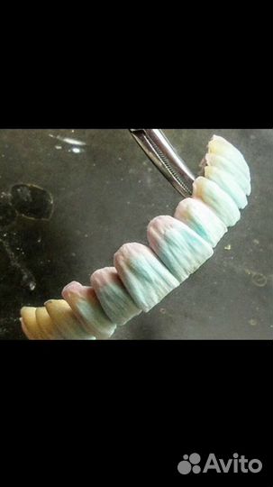 Зубной техник