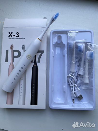 Новая электронная зубная щетка