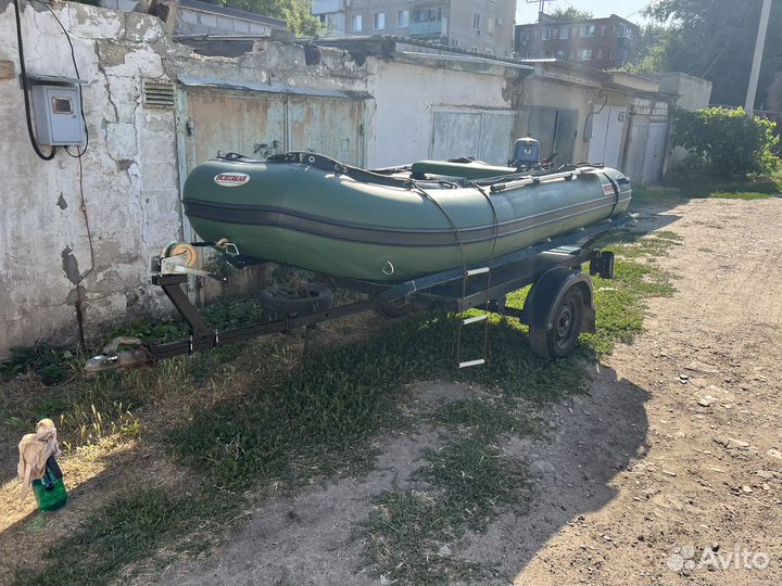 Лодка с мотором Gladiator 9,8 и прицепом