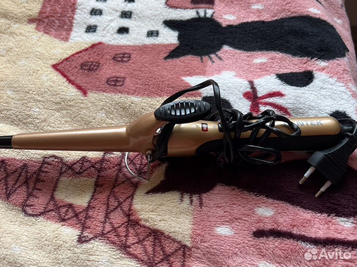 Конические щипцы для завивки волос