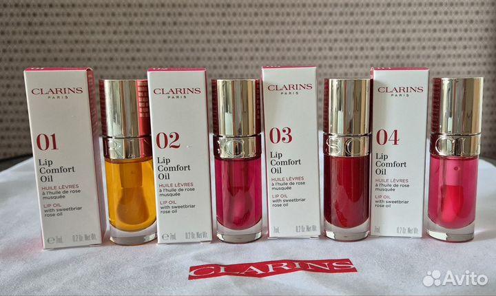 Clarins масло для губ 01, 02, 05