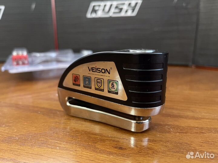 Замок на диск мотоцикла с сигнализацией