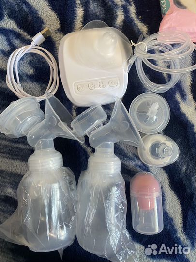 Молокоотсос medela электрический