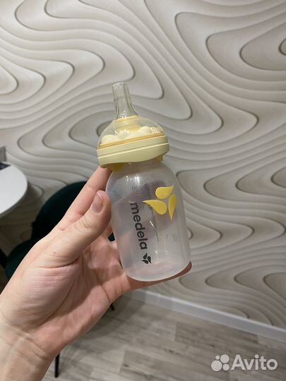 Молокоотсос medela