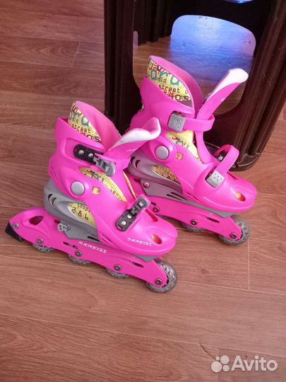 Роликовые коньки