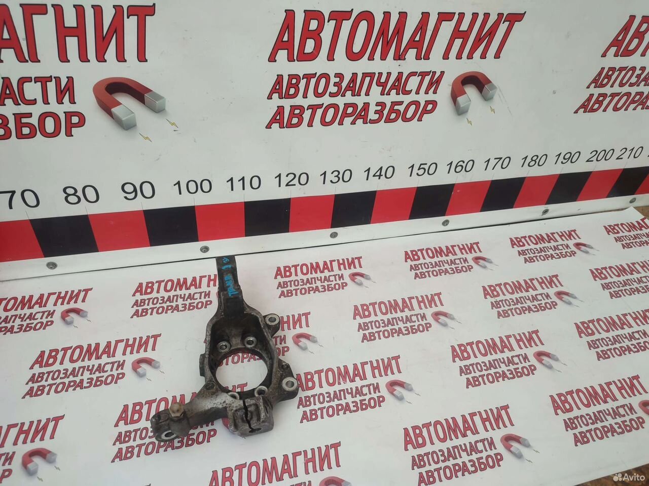 Кулак поворотный левый Ниссан Теана J32