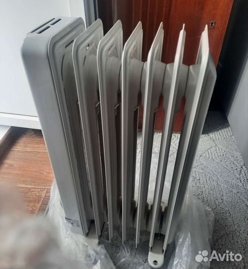 Масляный обогреватель delonghi