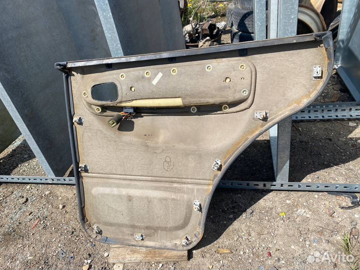 Обшивка двери задняя левая Kia Sportage