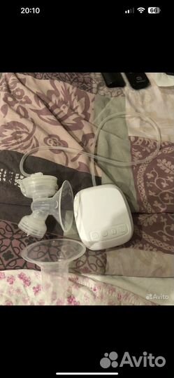 Молокоотсос электрический новый