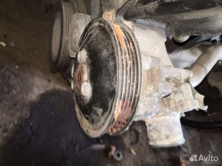 Помпа двигателя Opel Astra 1.6