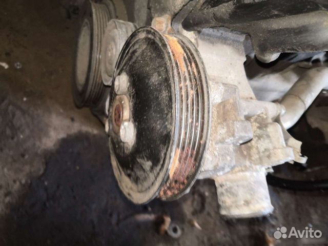 Помпа двигателя Opel Astra 1.6