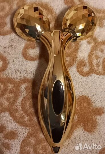 Роликовый массажер для лица