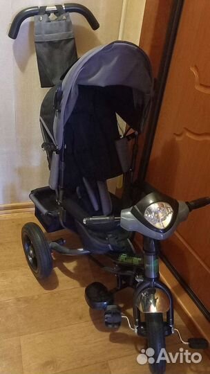 Трехколесный велосипед с ручкой