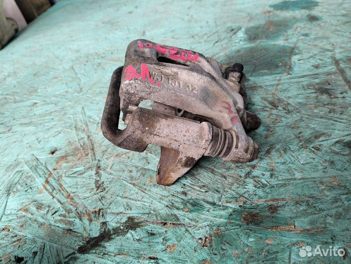 Суппорт задний левый Chevrolet Iacetti