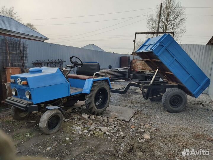 Мини-трактор, 2002