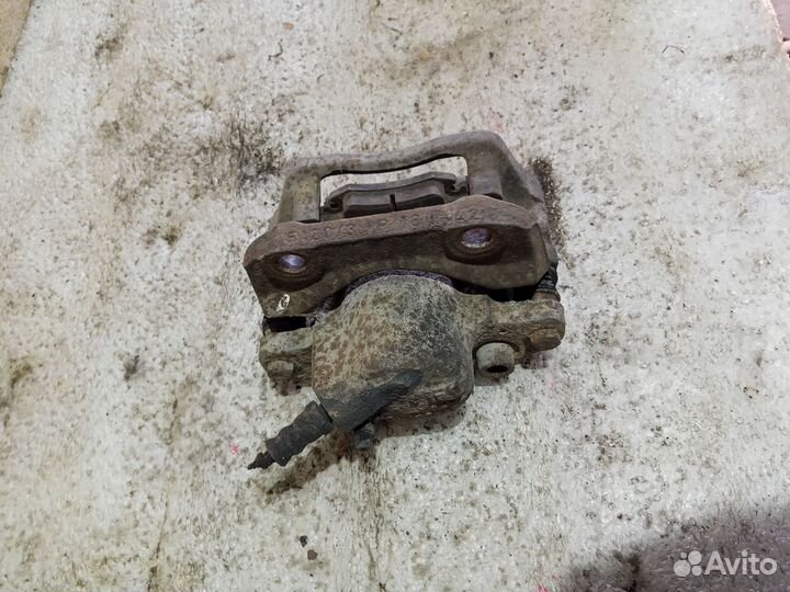 Суппорт тормозной передний правый renault logan 1