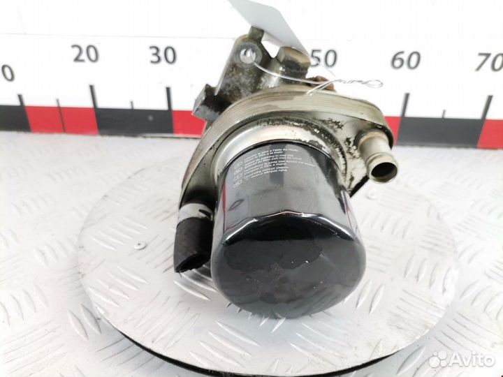 Теплообменник масляного фильтра Mazda 323 BA 1998