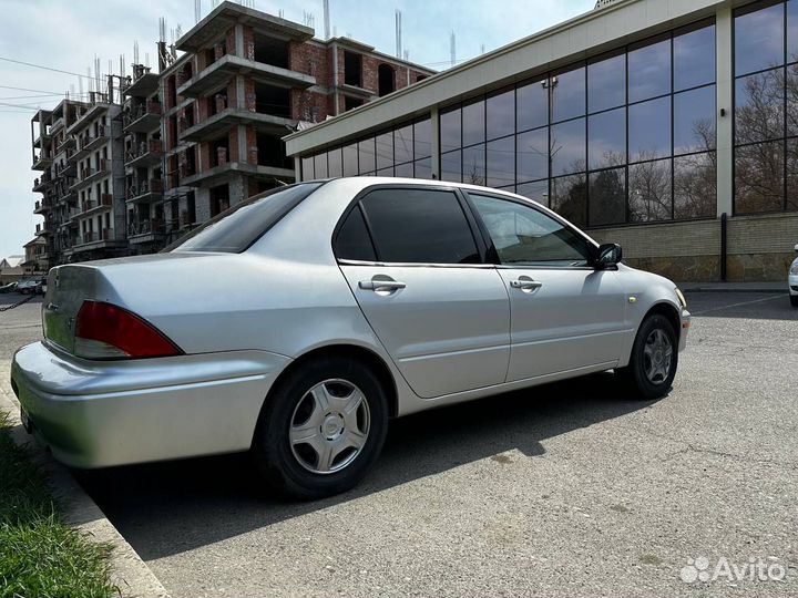 Mitsubishi Lancer 2.0 AT, 2002, 329 000 км