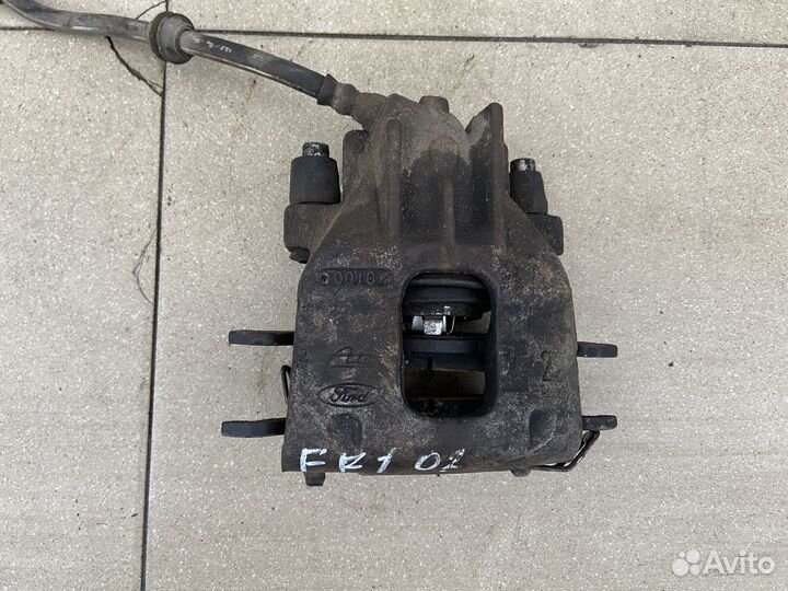 Тормозной суппорт передний правый Ford Focus 1