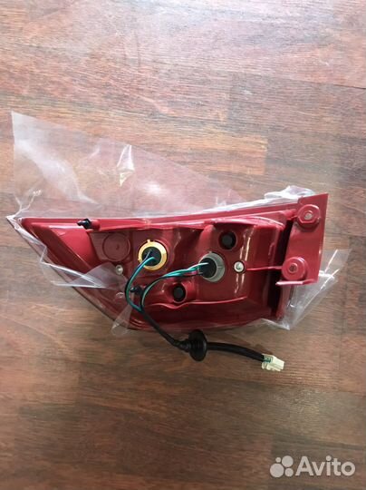 Фонарь задний левый mitsubishi 10 lancer новый