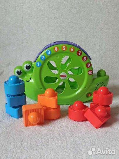 Игрушка музыкальный сортер Улитка Fisher price