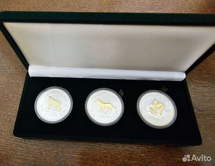 Серебряные монеты Восточный календарь с позолотой