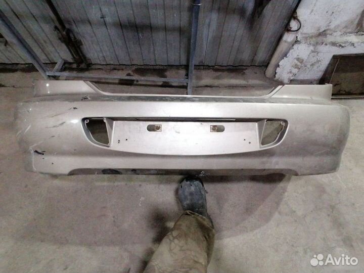 Бампер задний Kia Spectra