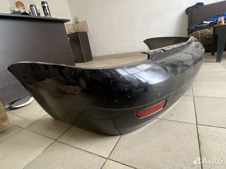Задний бампер на приору черный цвет