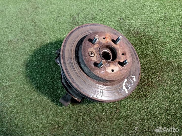 Поворотный кулак передний левый Kia Spectra седан