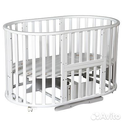 Круглая кроватка с маятником